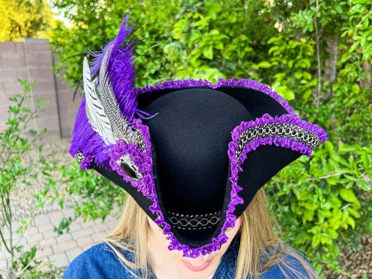 Tricorn Hat 22" Black Polyester Base with Purple Trim, Feathers, and Silver Brooch