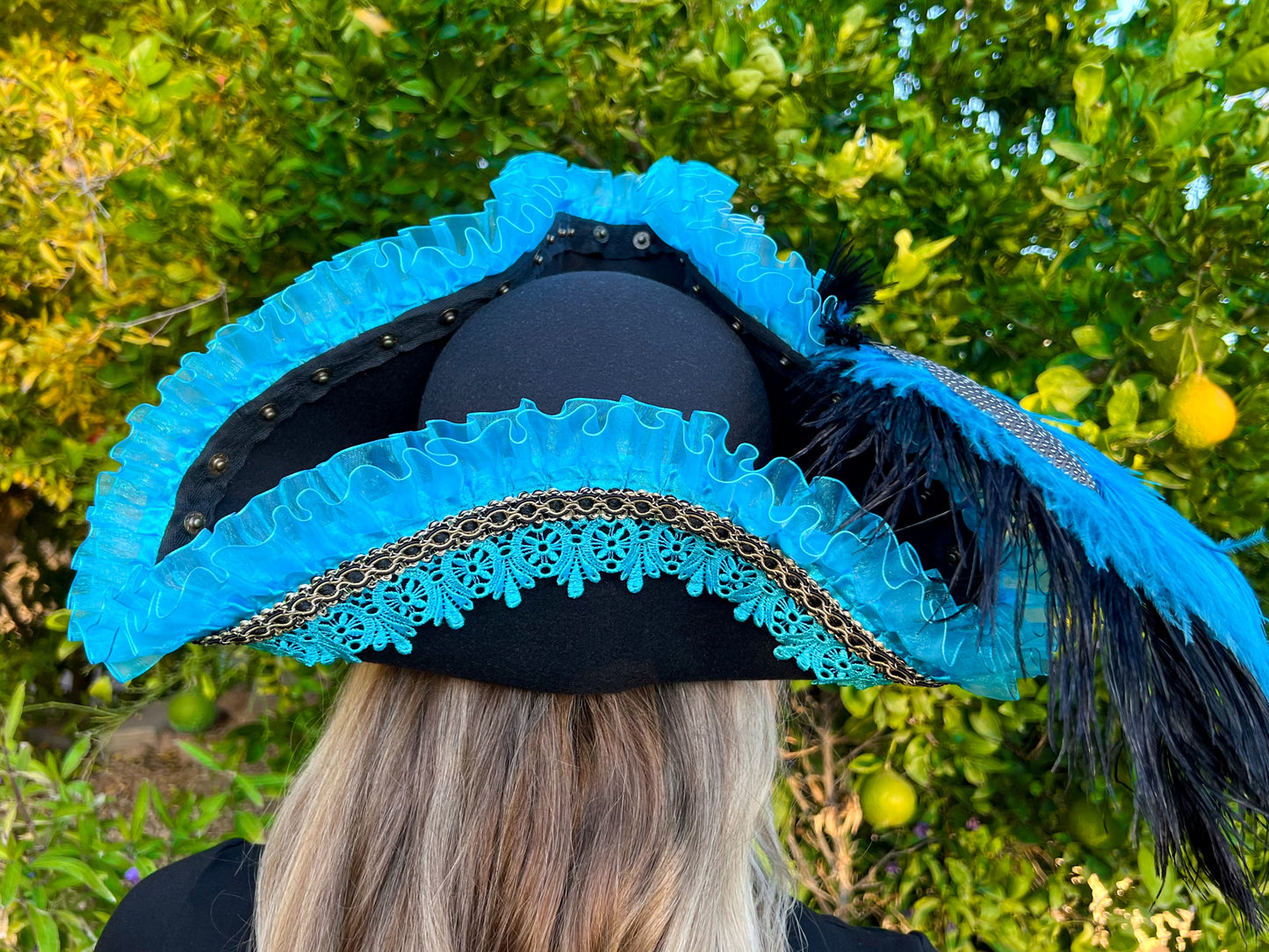 Tricorn Hat 22" Black Polyester Base with Turquoise Trim, Feathers, and Ship Brooch