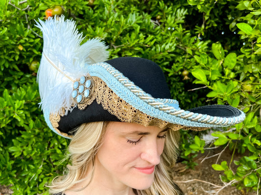 Cavalier Hat 21.75" Black Wool Base with Baby Blue Trim, Feathers, and Brooch