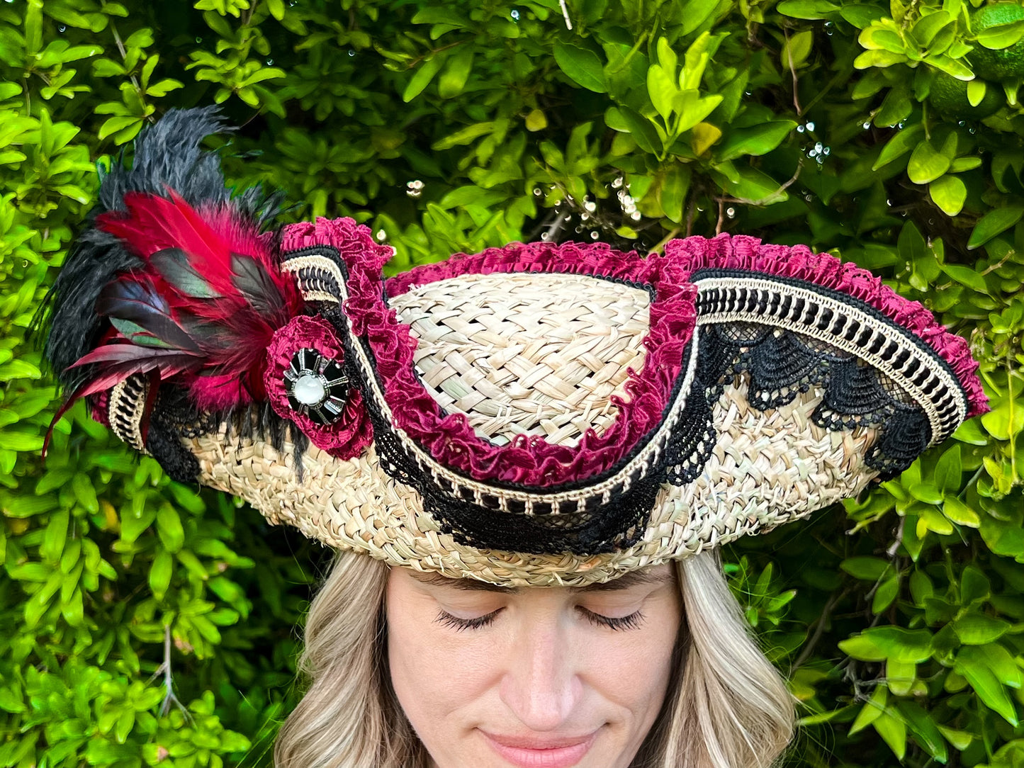 Tricorn Hat 21.75" Beige Straw Base with Maroon/Black Trim, Feathers, and Brooch