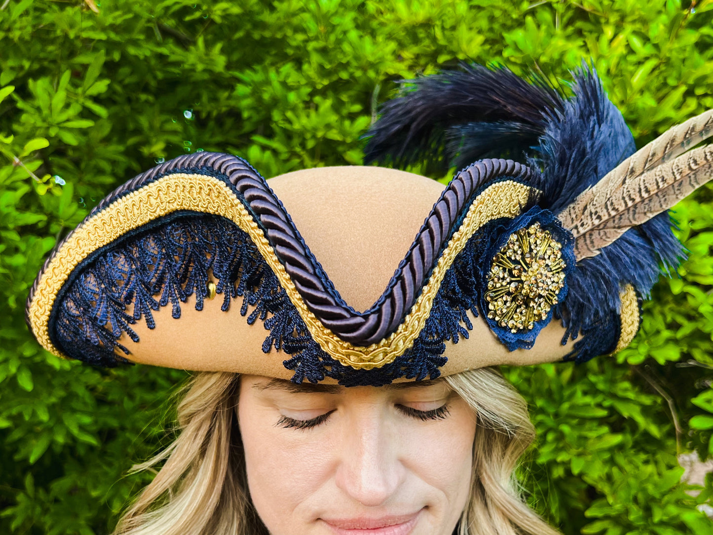 Tricorn Hat 22" Tan Polyester Base with Navy/Gold Trim, Feathers, and Brooch