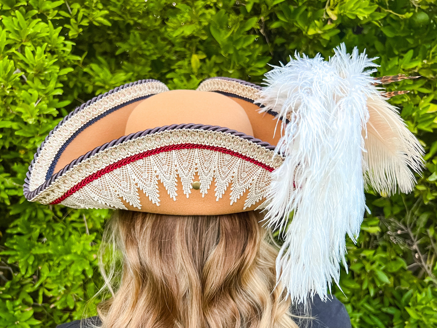 Tricorn Hat 22" Tan Polyester Base with Navy/Red/White Trim, Feathers, and Brooch