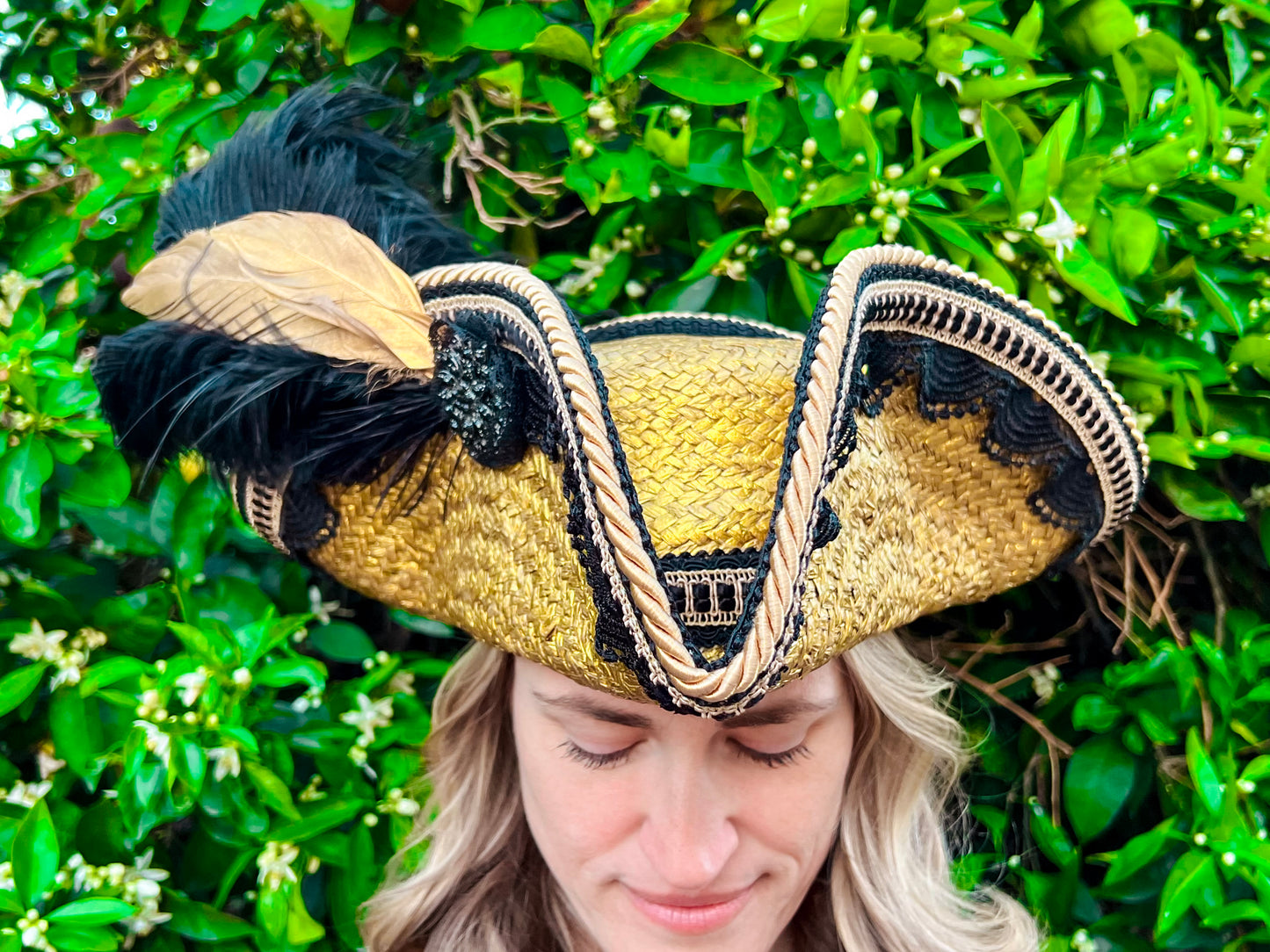 Tricorn Hat 21.75" Gold Straw Base with Black Trim, Feathers, and Rhinestone Brooch