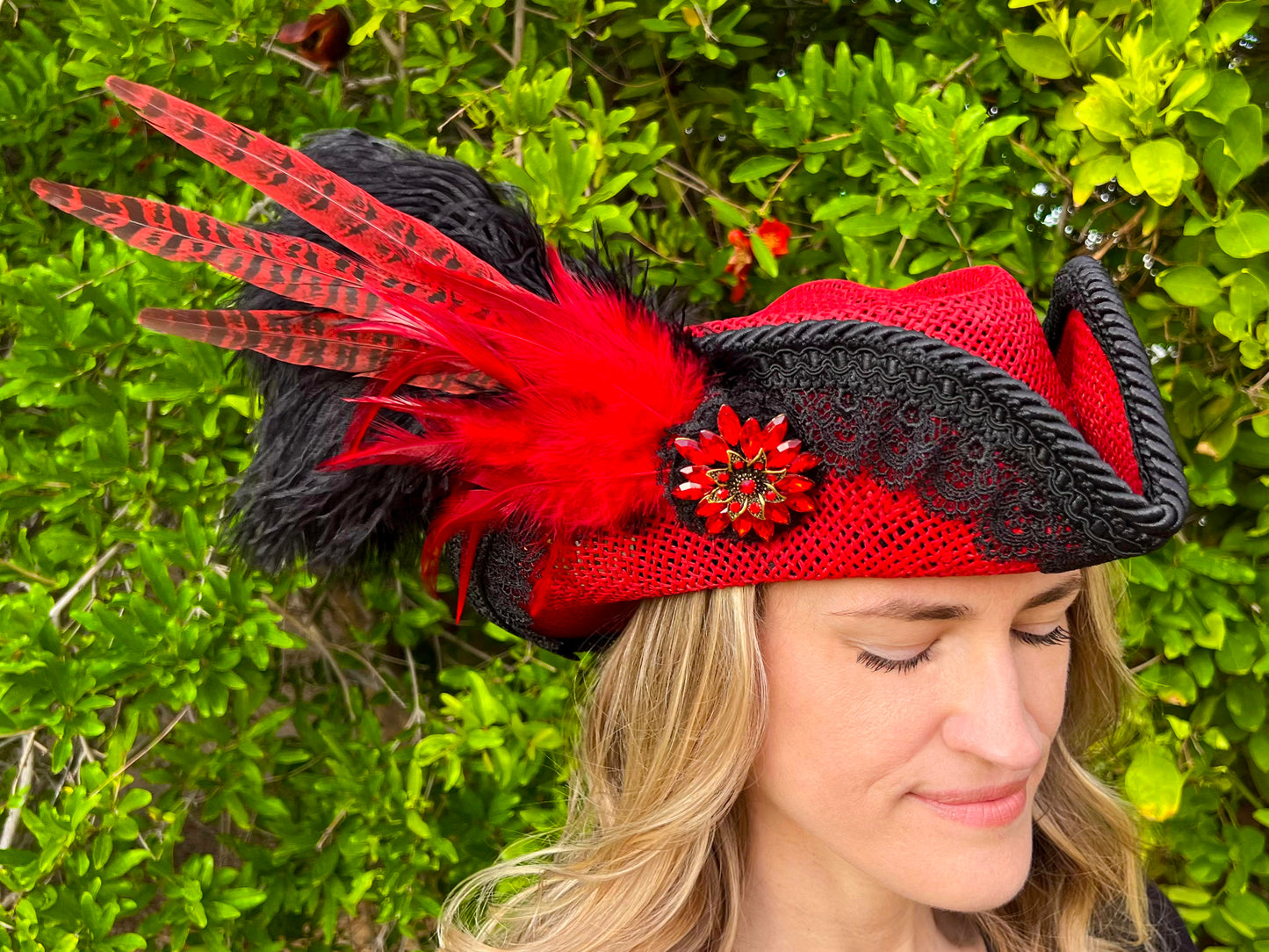 Bicorn Hat 22.5" Red Straw Base with Black Trim, Feathers, and Rhinestone Brooch