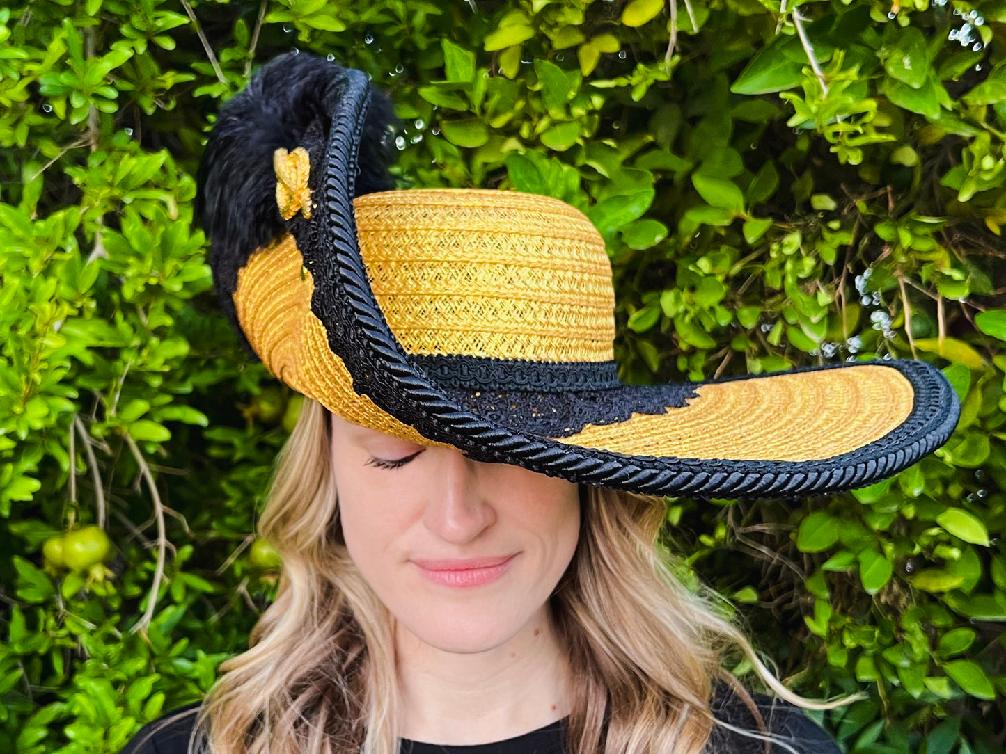 Cavalier Hat 21.75" Gold Polyester Base with Black Trim, Feathers, and Brooch