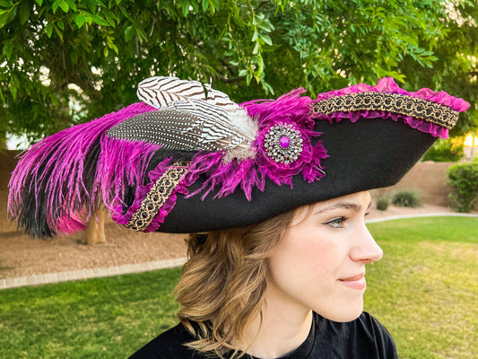 Tricorn Hat 22.5" Black Wool Base with Magenta Trim, Feathers, and Silver Brooch