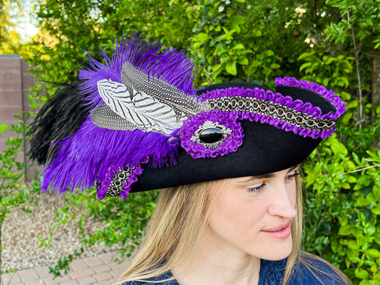 Tricorn Hat 22" Black Polyester Base with Purple Trim, Feathers, and Silver Brooch