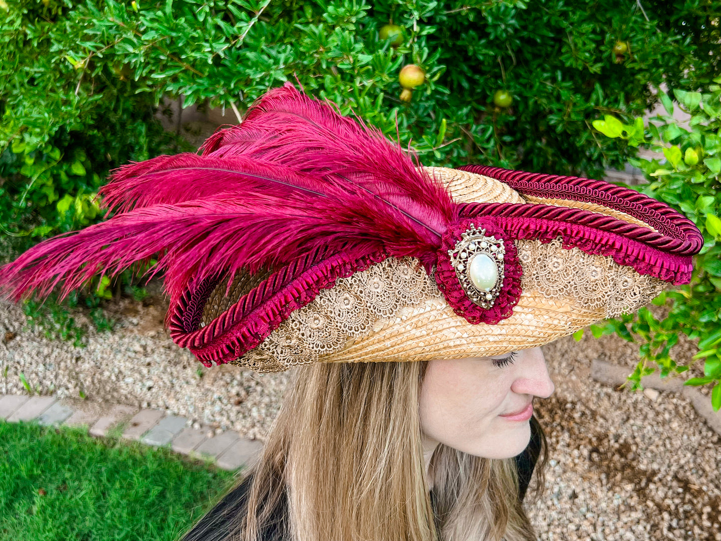 Tricorn Hat 21.75" Beige Straw Base with Maroon Trim, Feathers, and Pearl Brooch