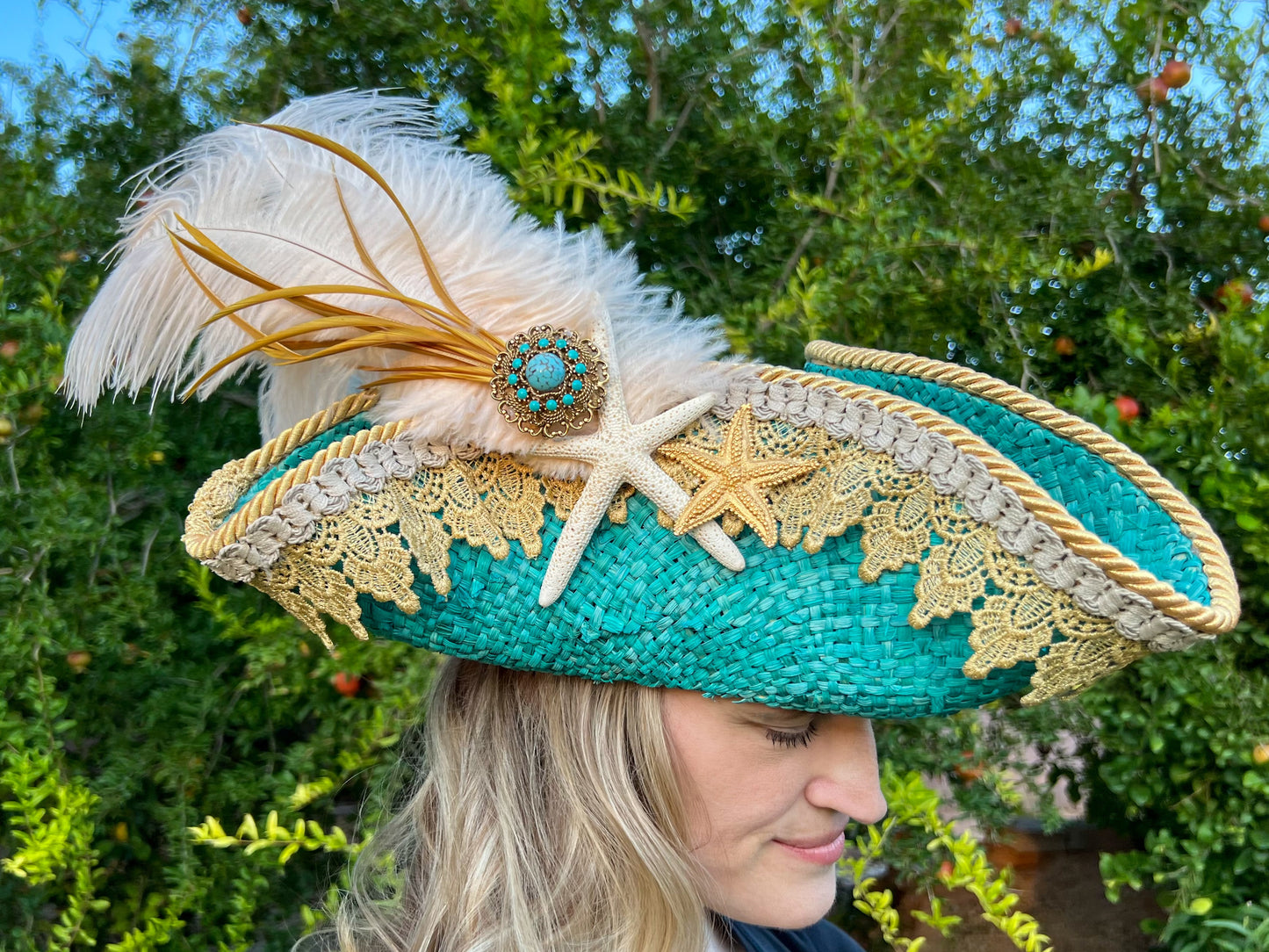 Tricorn Hat 23" Turquoise Straw Base with Gold Trim, Feathers, and Starfish Brooch