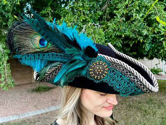 Tricorn Hat 21.75" Black Polyester Base with Teal Trim, Feathers, and Amber Brooch