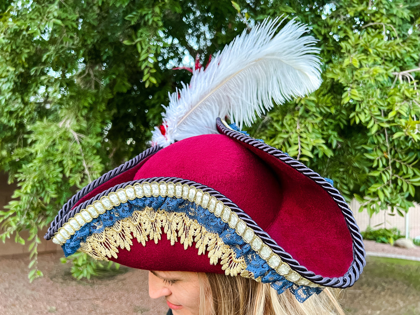 Tricorn Hat 21.75" Maroon Polyester Base with Gold/Navy Trim, Feathers, and Brooch