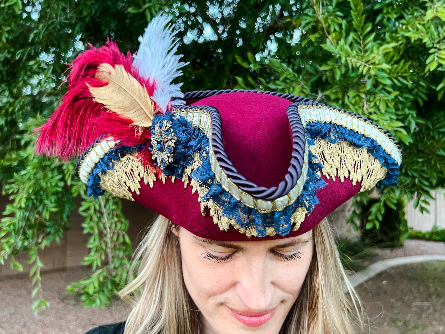 Tricorn Hat 21.75" Maroon Polyester Base with Gold/Navy Trim, Feathers, and Brooch