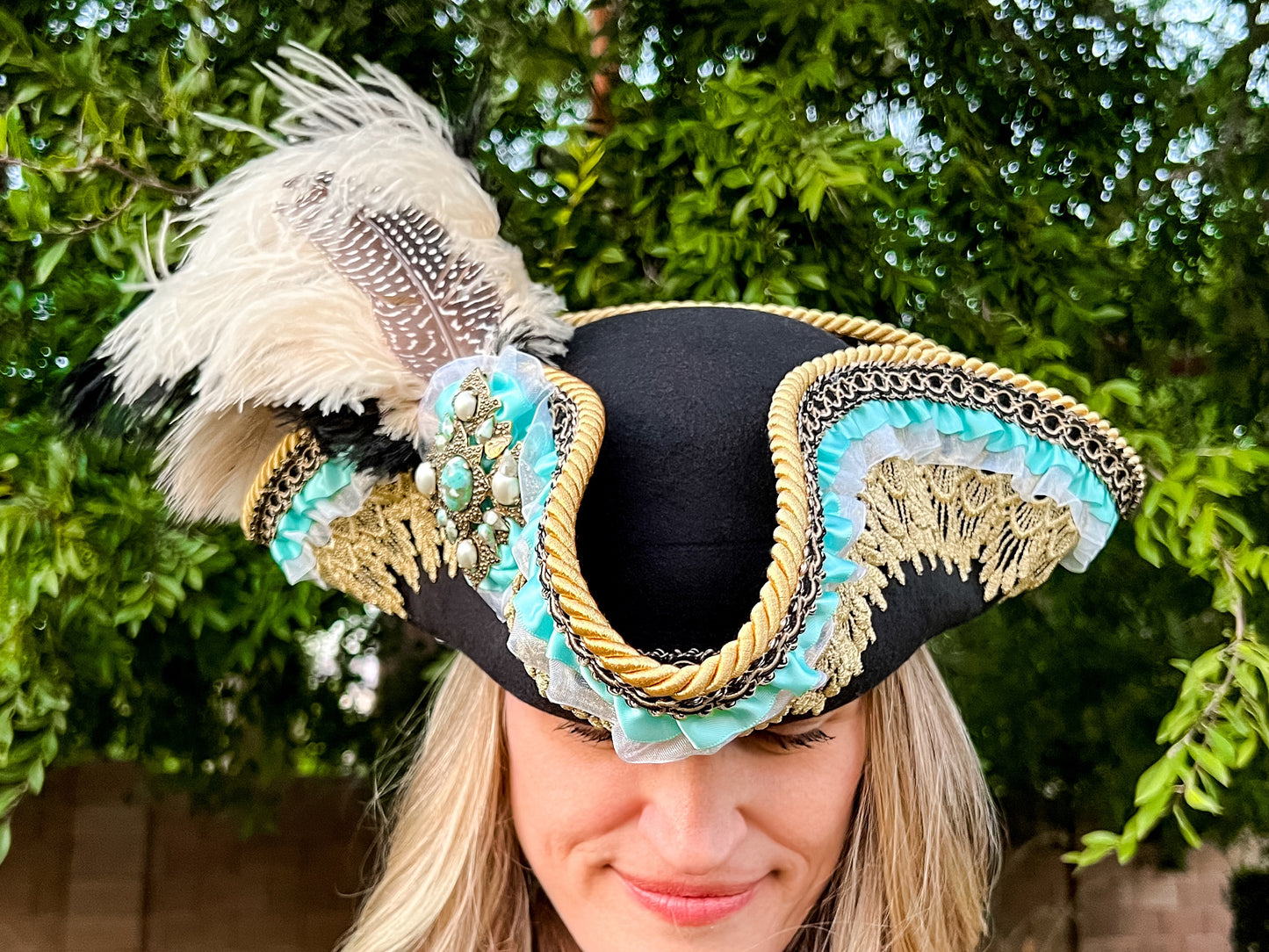 Tricorn Hat 22" Black Polyester Base with Gold Trim, Feathers, and Turquoise Brooch