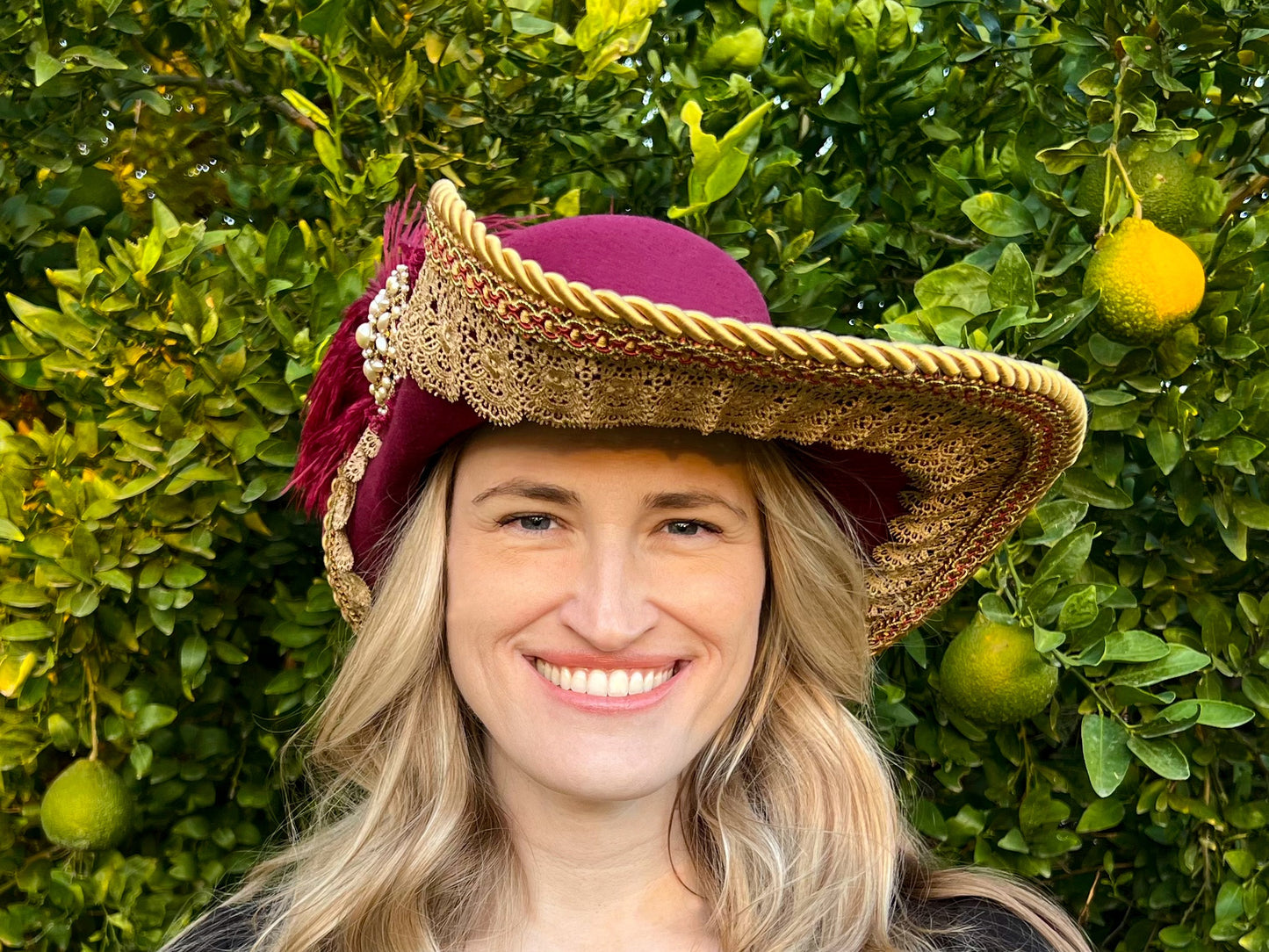 Cavalier Hat 22" Maroon Polyester Base with Gold Trim, Feathers, and Pearl Brooch