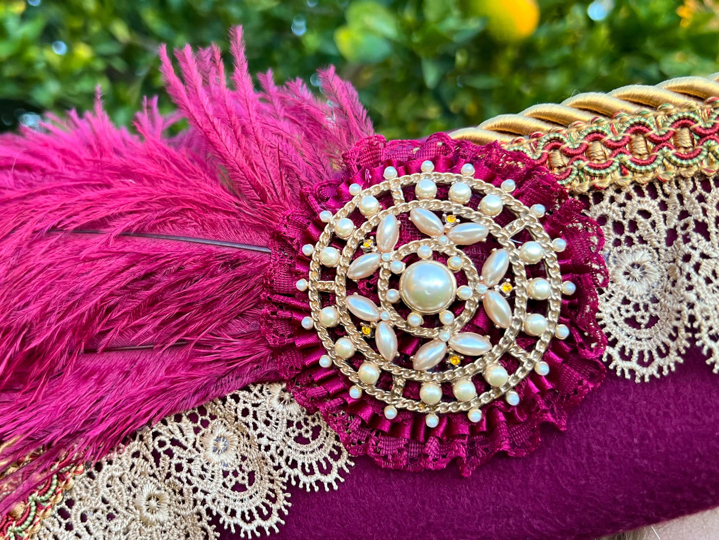 Cavalier Hat 22" Maroon Polyester Base with Gold Trim, Feathers, and Pearl Brooch