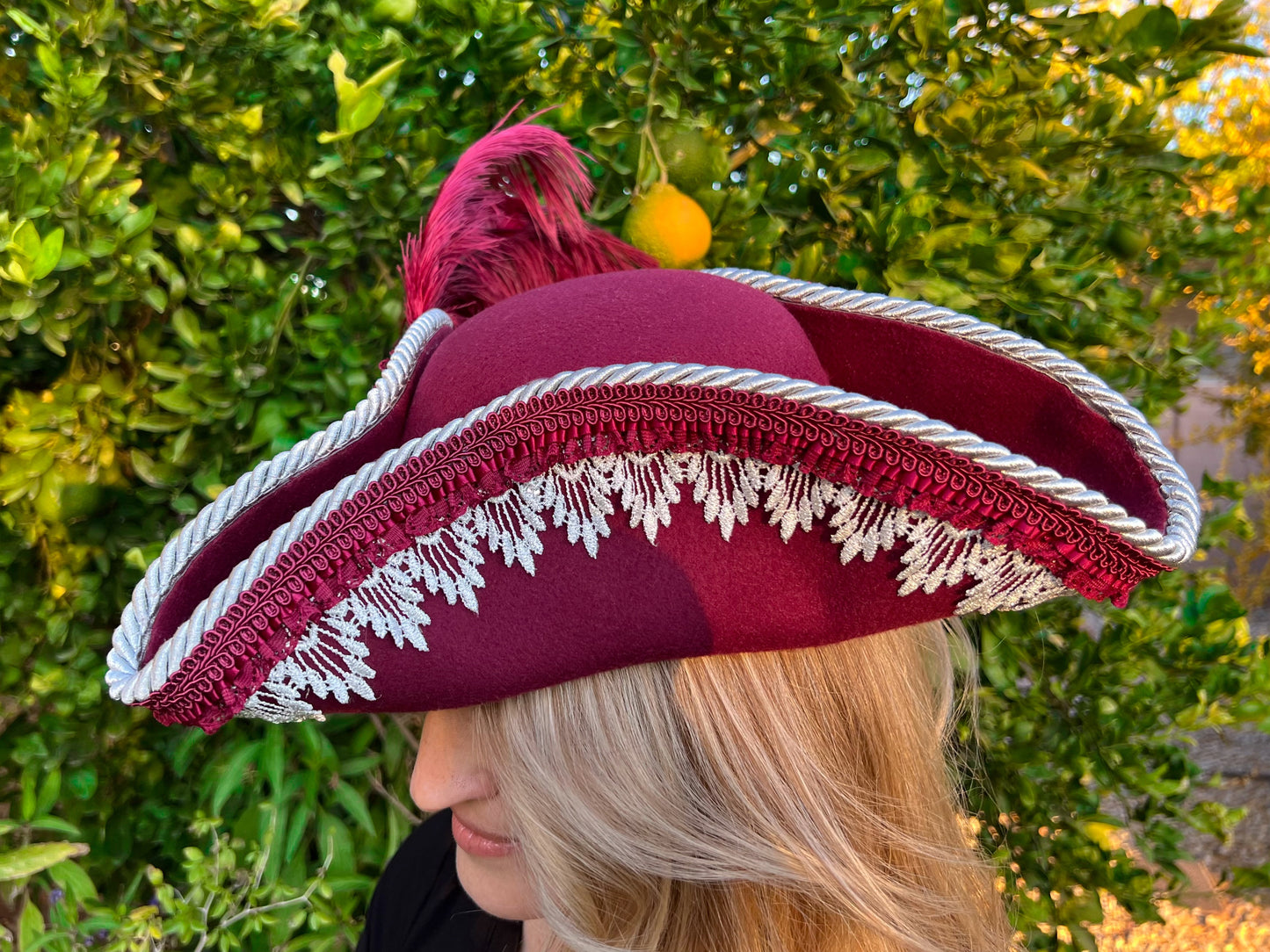 Tricorn Hat 22" Maroon Polyester Base with Silver Trim, Feathers, and Brooch