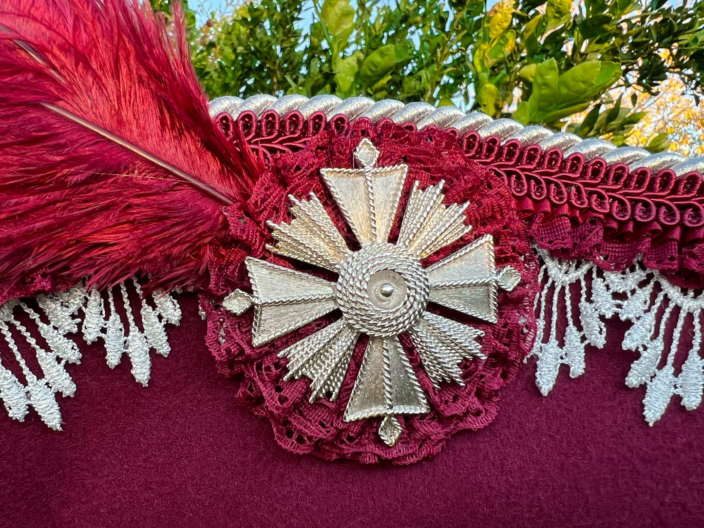 Tricorn Hat 22" Maroon Polyester Base with Silver Trim, Feathers, and Brooch