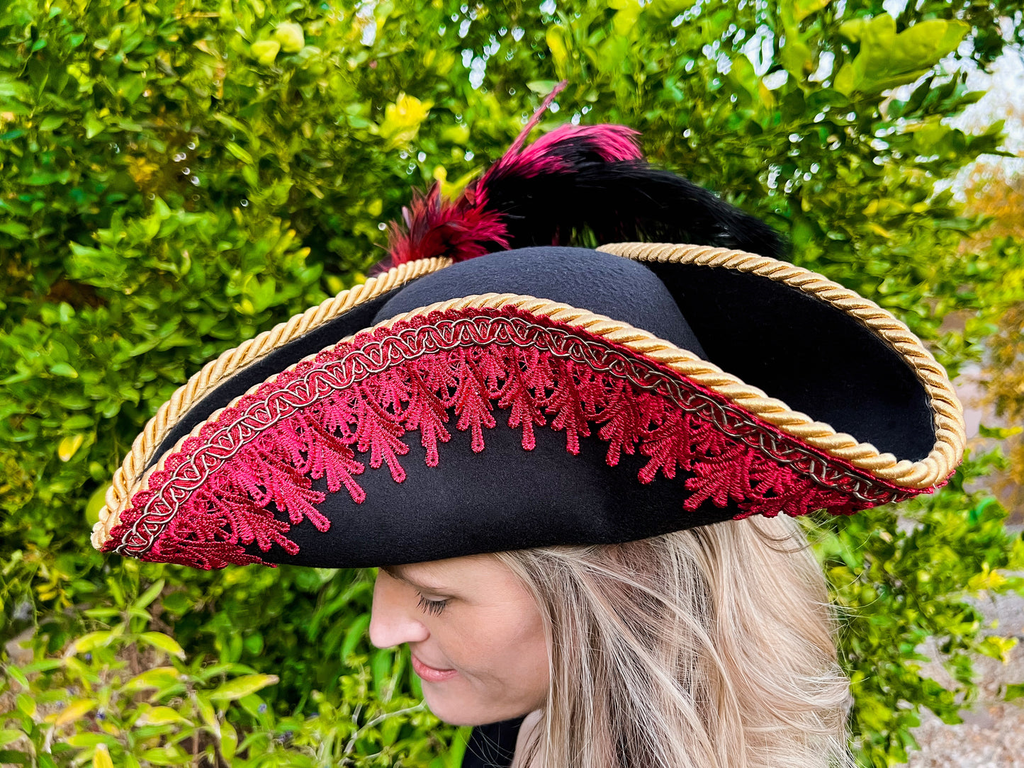 Tricorn Hat 22" Black Polyester Base with Red Trim, Feathers, and Gold Shield Brooch