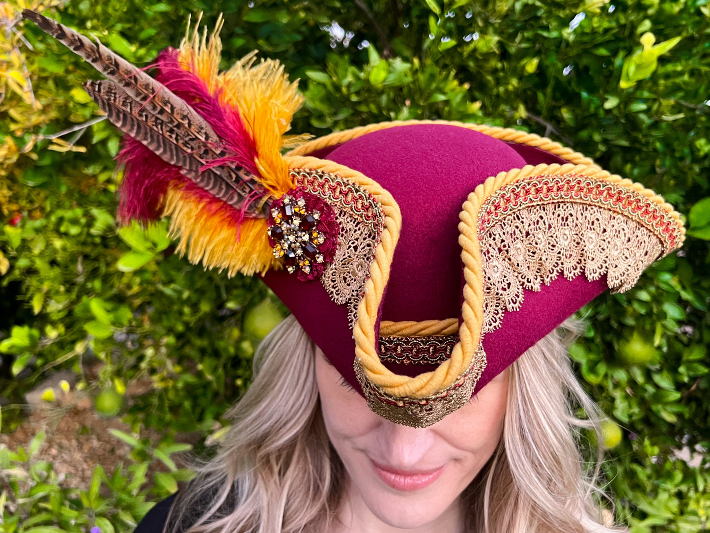 Tricorn Hat 22" Maroon Polyester Base with Mustard Trim, Feathers, and Brooch