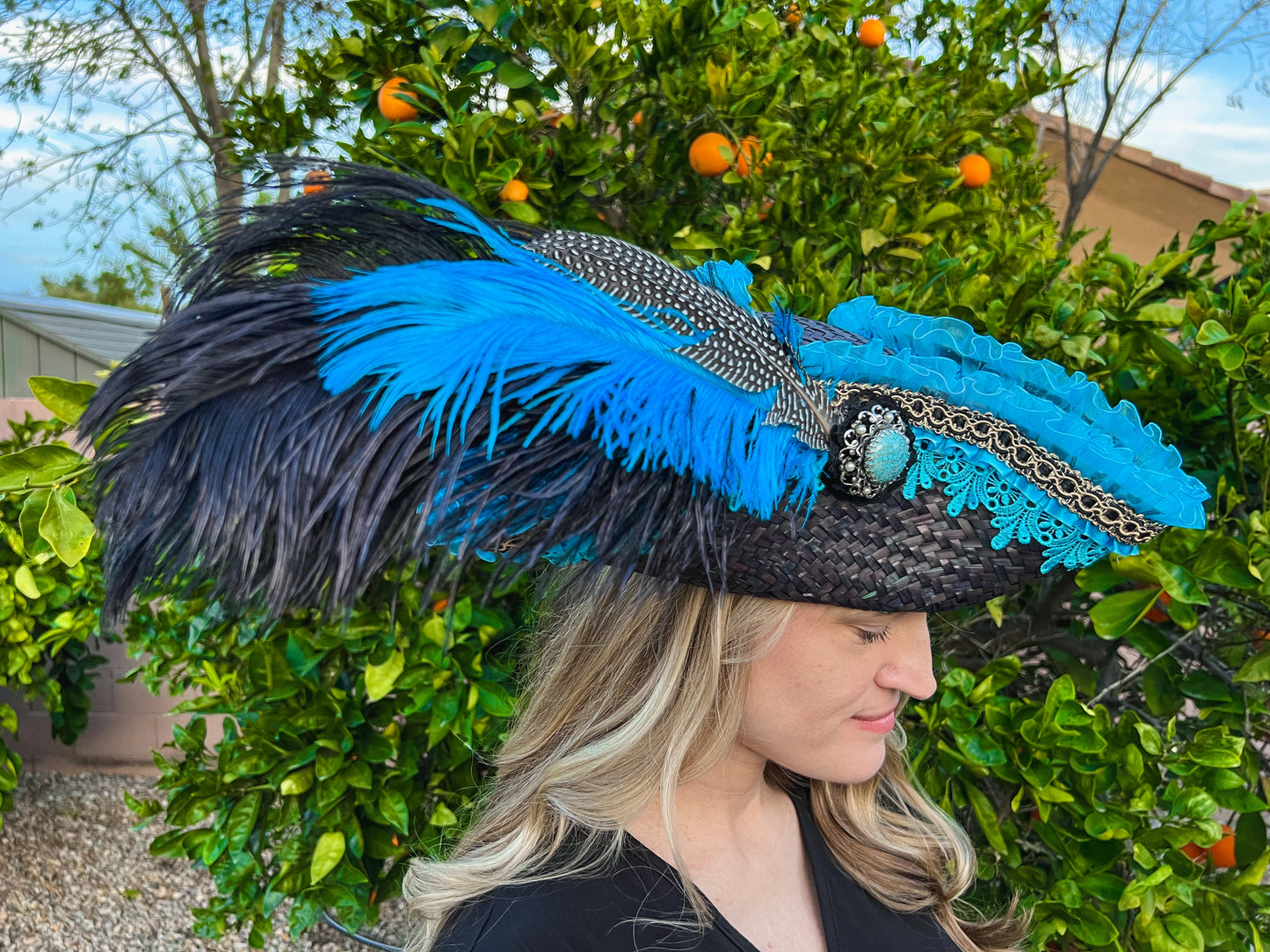 Tricorn Hat 22.5" Black Straw Base with Turquoise Trim, Feathers, and Silver Brooch