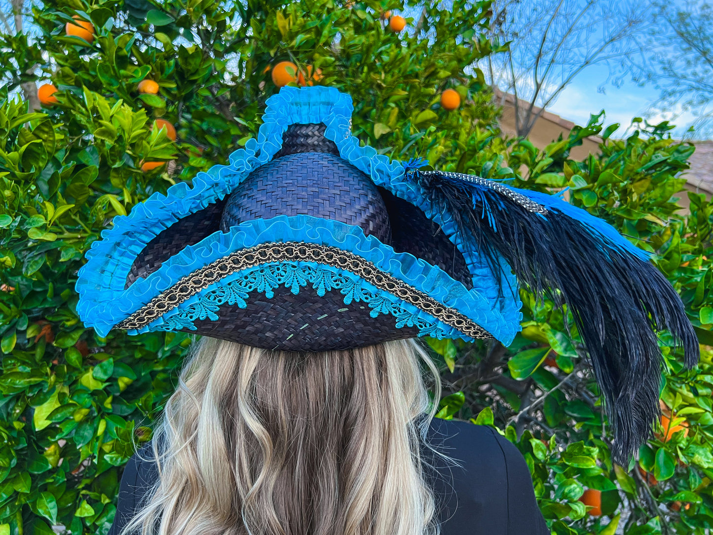 Tricorn Hat 22.5" Black Straw Base with Turquoise Trim, Feathers, and Silver Brooch