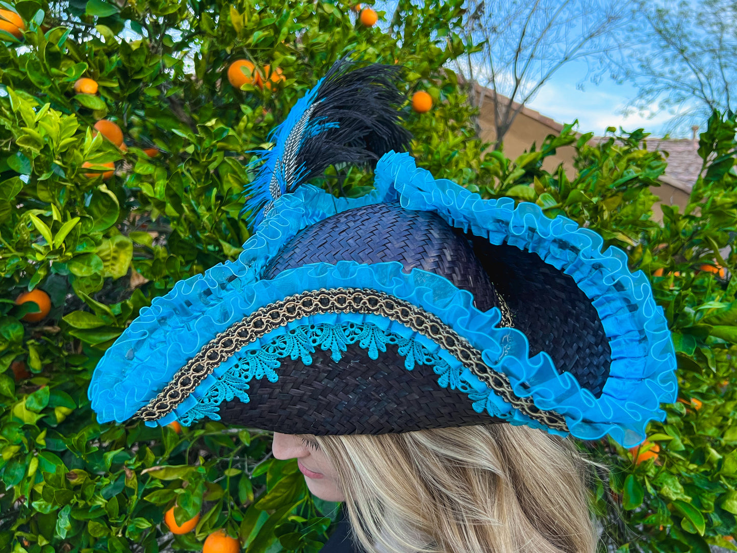 Tricorn Hat 22.5" Black Straw Base with Turquoise Trim, Feathers, and Silver Brooch