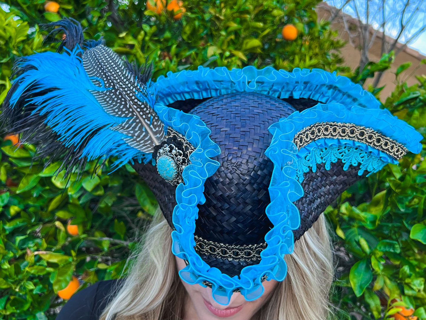 Tricorn Hat 22.5" Black Straw Base with Turquoise Trim, Feathers, and Silver Brooch