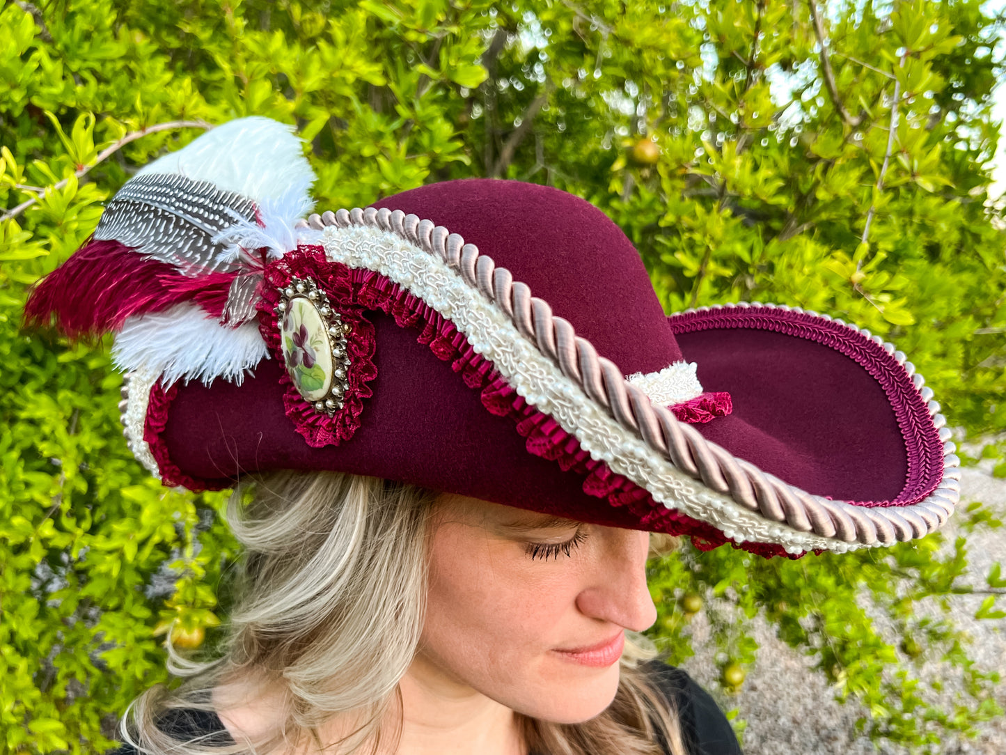 Cavalier Hat 21.75" Maroon Wool Base with Cream Trim, Feathers, and Brooch