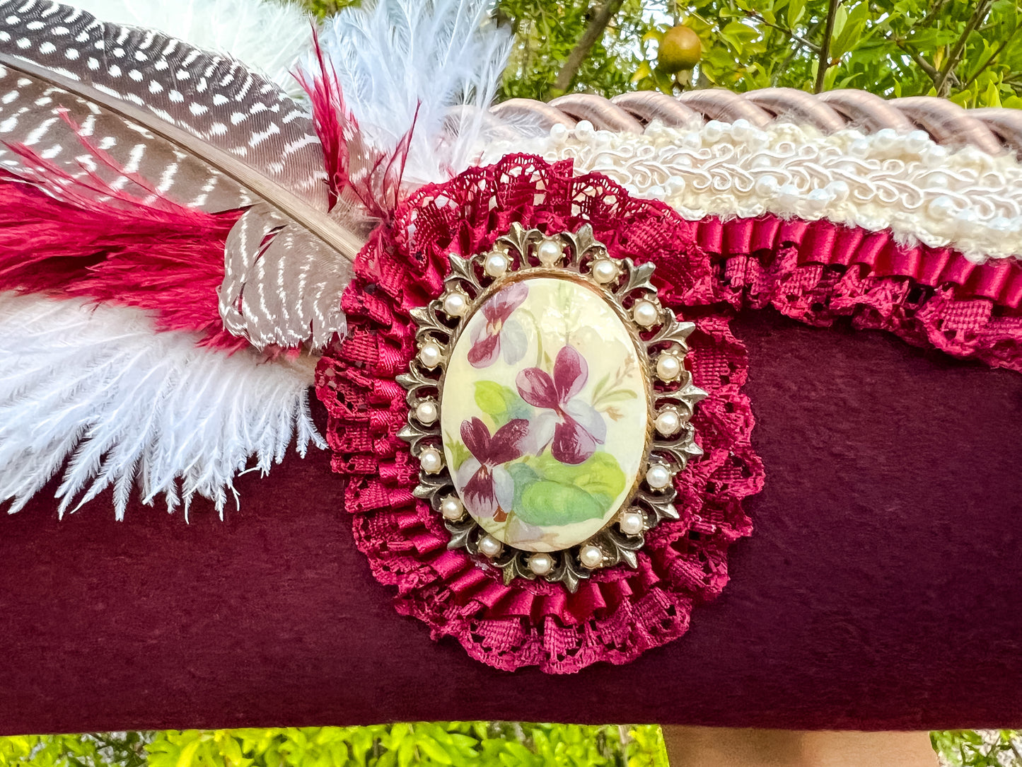 Cavalier Hat 21.75" Maroon Wool Base with Cream Trim, Feathers, and Brooch