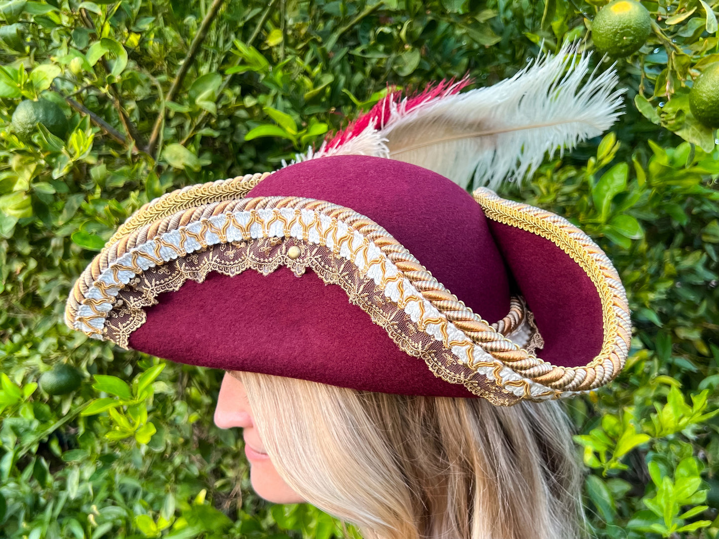 Tricorn Hat 21.75" Maroon Wool Base with Gold Trim, White Feathers, and Floral Brooch