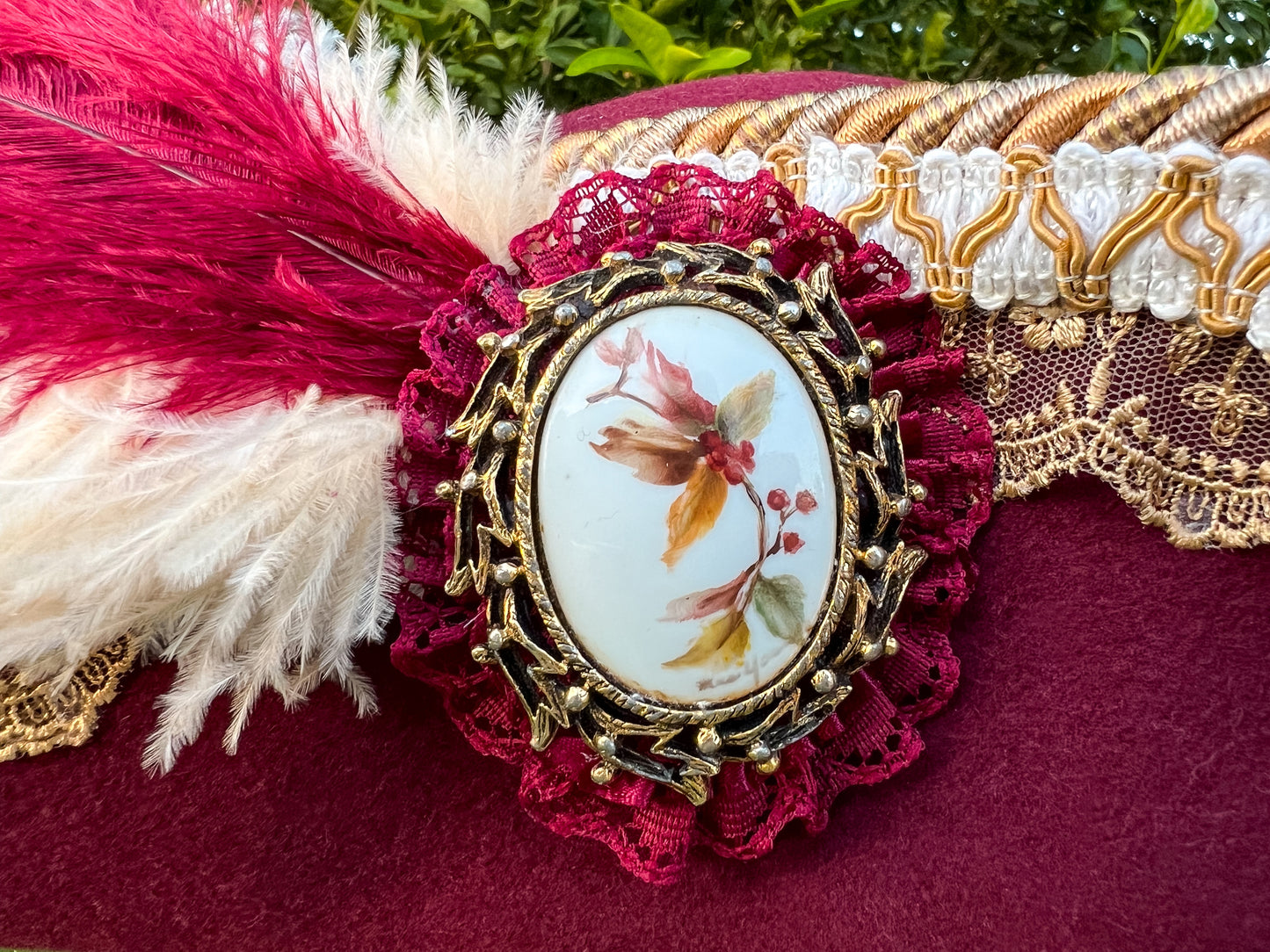 Tricorn Hat 21.75" Maroon Wool Base with Gold Trim, White Feathers, and Floral Brooch