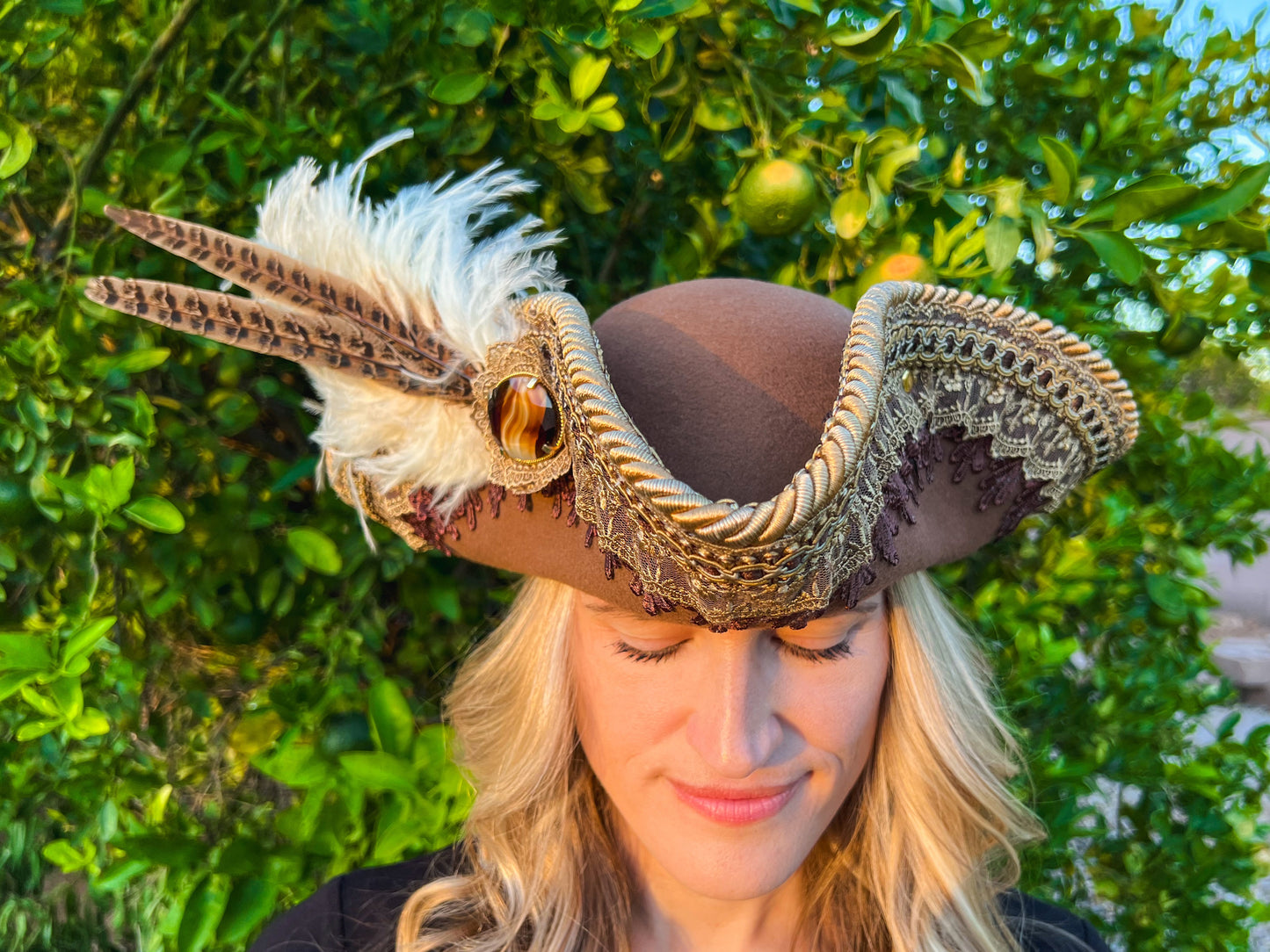 Tricorn Hat 22" Tan Wool Base with Brown/Gold Trim, Feathers, and Amber Brooch