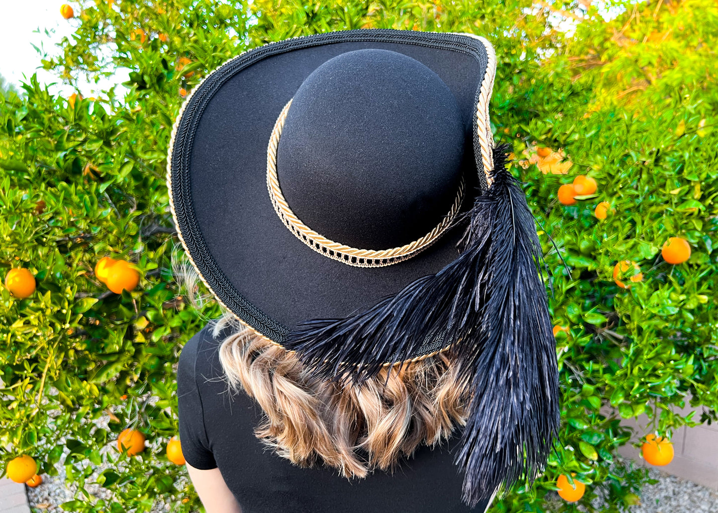 Cavalier Hat 23" Black Polyester Base with Gold Trim, Feathers, and Gold Brooch