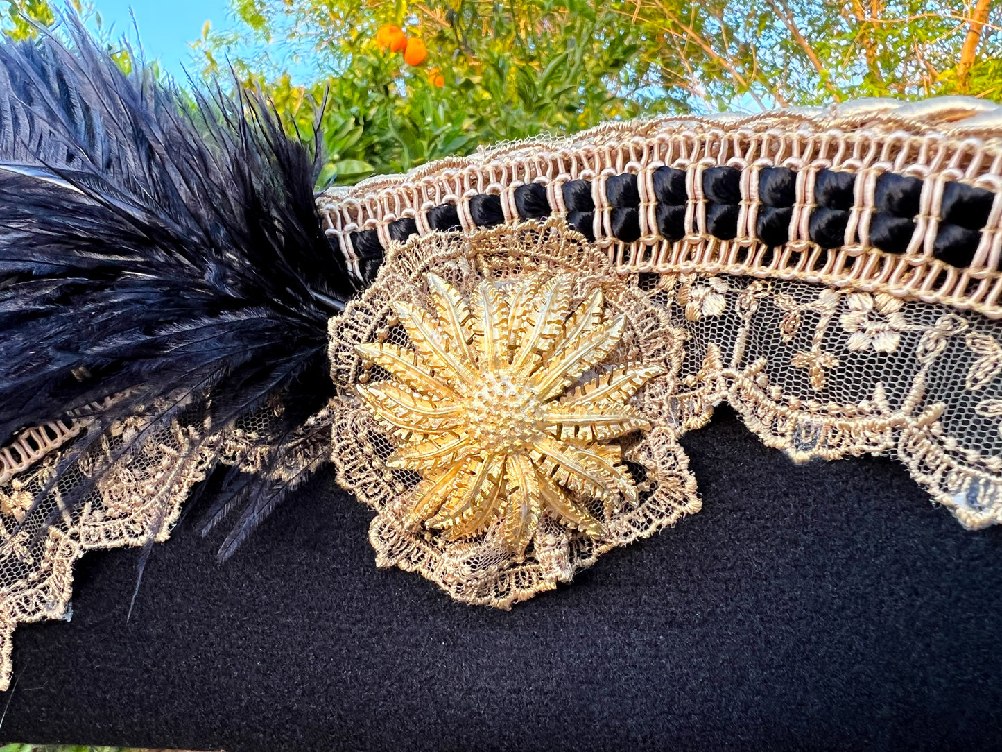 Cavalier Hat 23" Black Polyester Base with Gold Trim, Feathers, and Gold Brooch