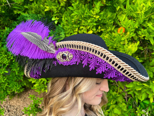 Cavalier Hat 22.5" Black Polyester Base with Purple Trim, Feathers, and Brooch