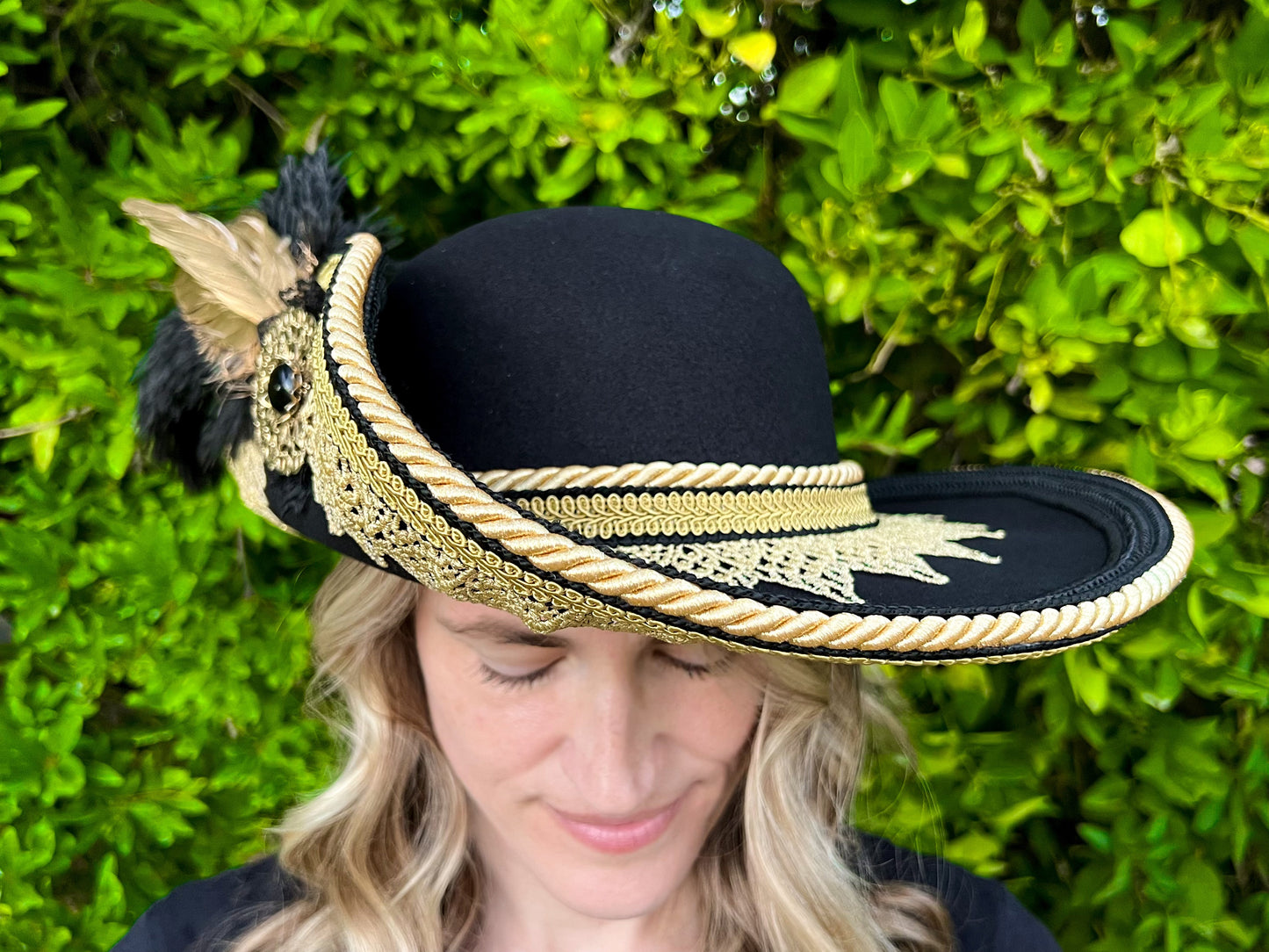 Cavalier Hat 22" Black Polyester Base with Gold Trim, Feathers, and Brooch