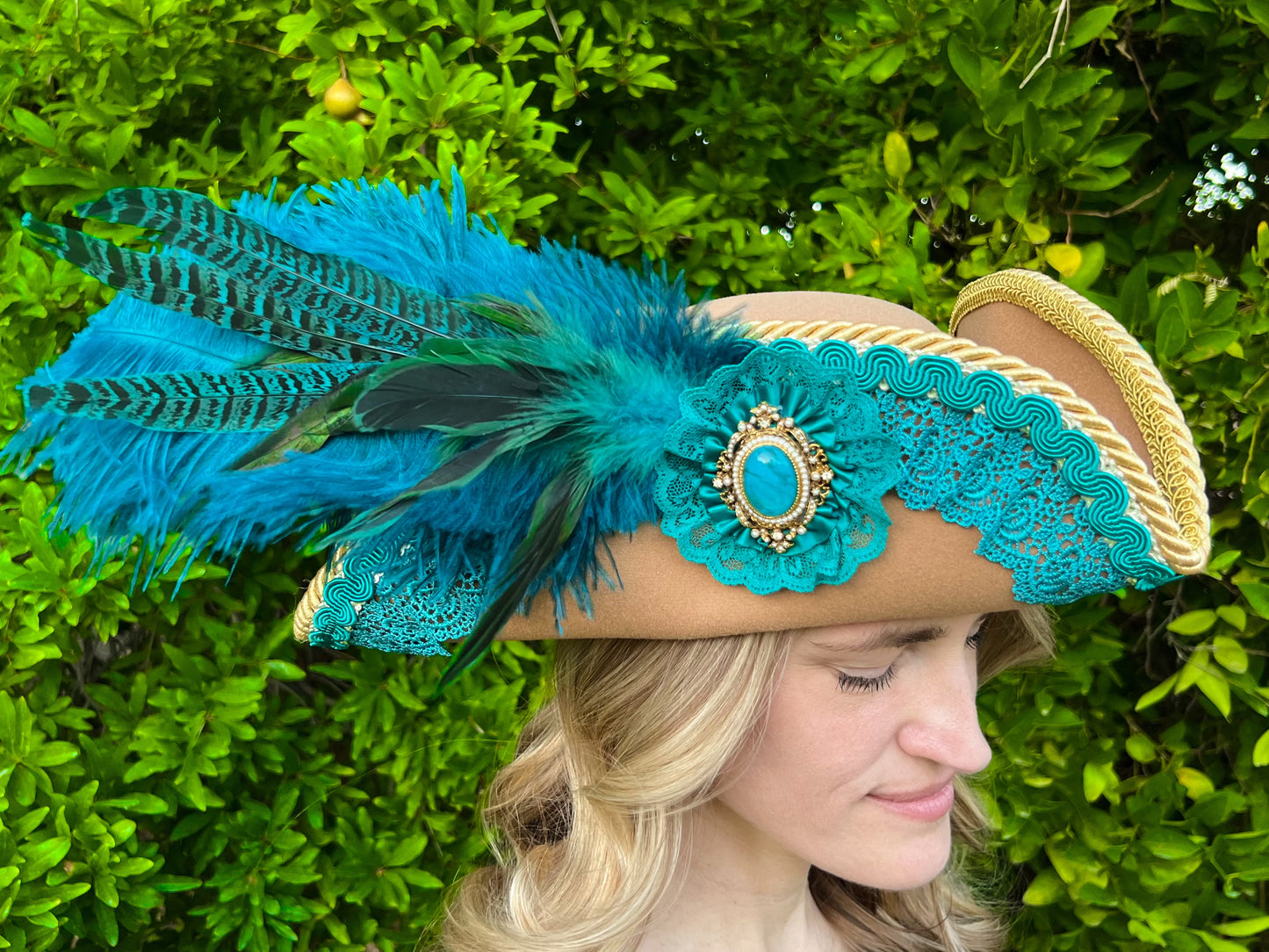 Tricorn Hat 22" Tan Polyester Base with Teal Trim, Feathers, and Turquoise Brooch