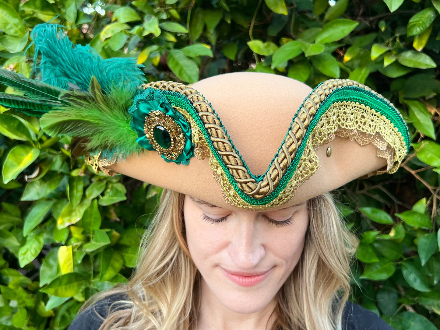 Tricorn Hat 22" Tan Polyester Base with Emerald Green Trim, Feathers, and Brooch