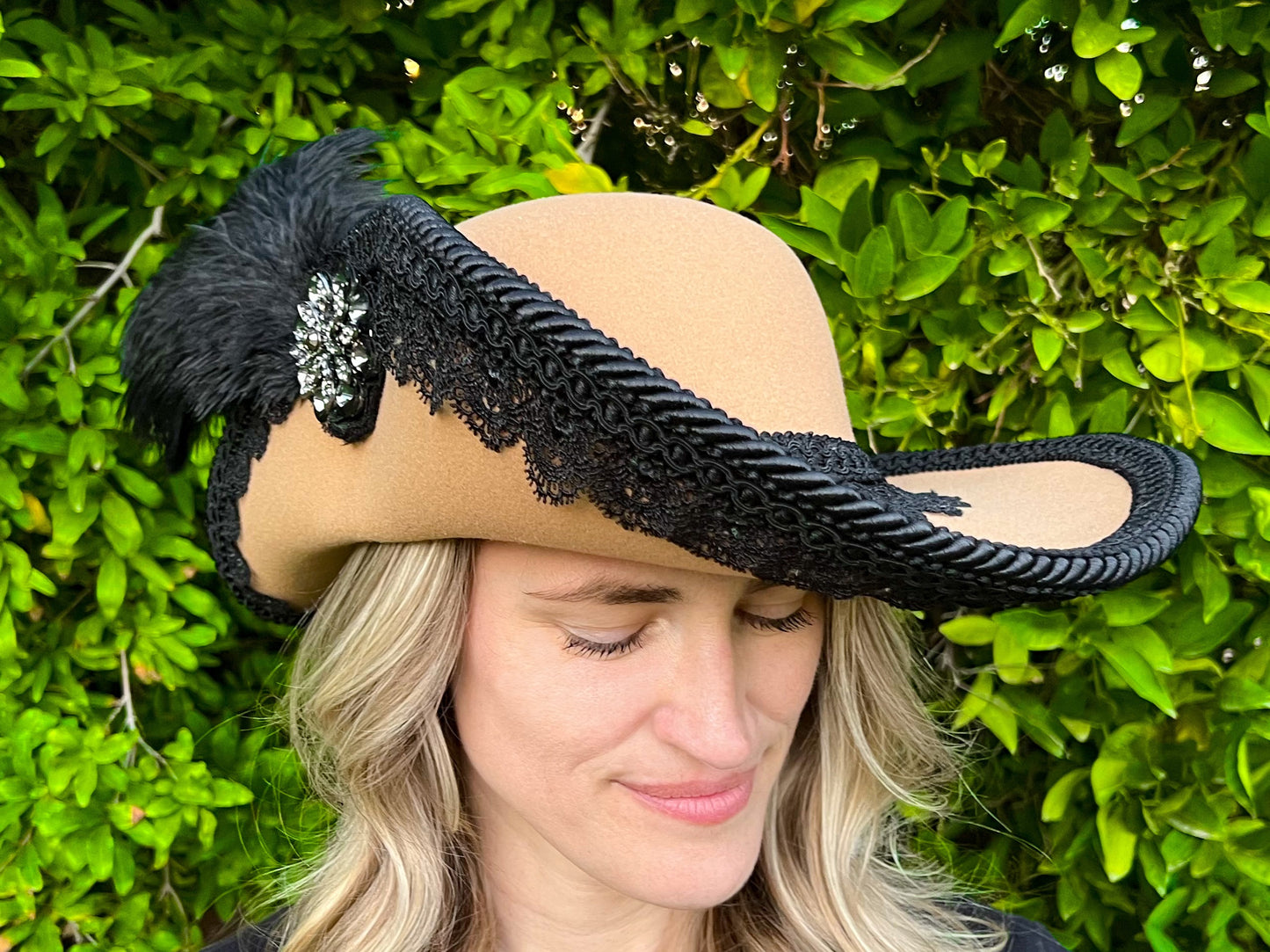 Cavalier Hat 22" Tan Polyester Base with Black Trim, Feathers, and Rhinestone Brooch