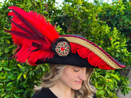 Cavalier Hat 21.75" Black Polyester Base with Red Trim, Feathers, and Brooch