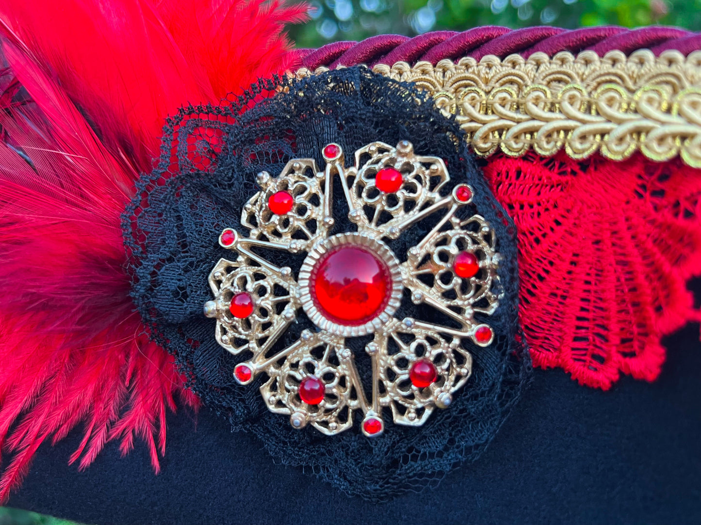 Cavalier Hat 21.75" Black Polyester Base with Red Trim, Feathers, and Brooch