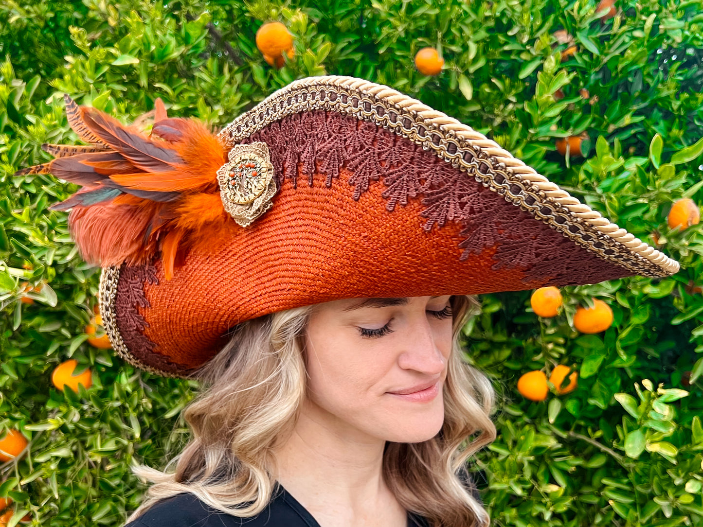 Cavalier Hat 22" Orange/Rust Straw Base with Brown Trim, Feathers, and Brooch