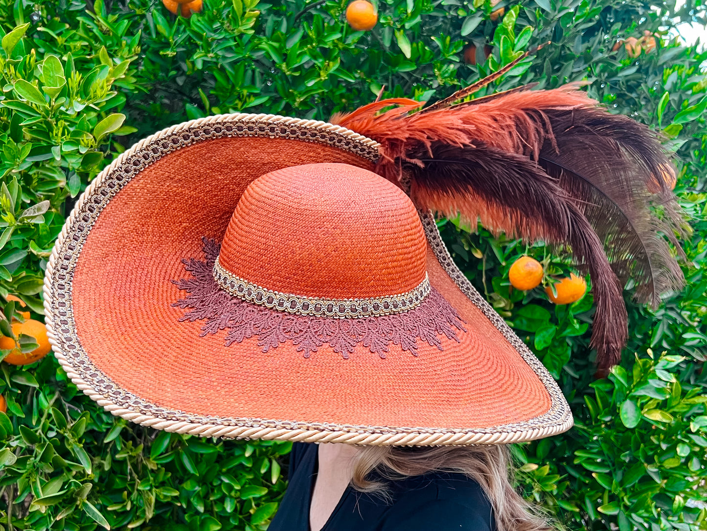 Cavalier Hat 22" Orange/Rust Straw Base with Brown Trim, Feathers, and Brooch