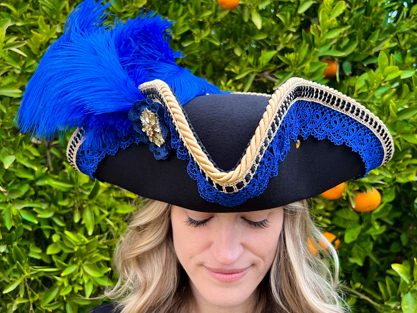 Tricorn Hat 23" Black Polyester Base with Royal Blue Trim, Feathers, and Brooch