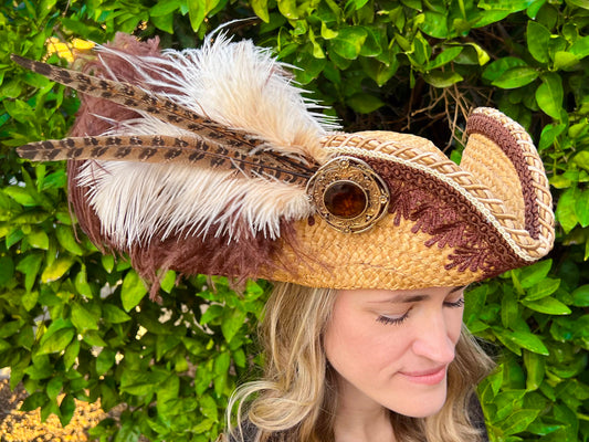 Tricorn Hat 21.25" Tan Straw Base with Brown/Gold Trim, Feathers, and Brooch