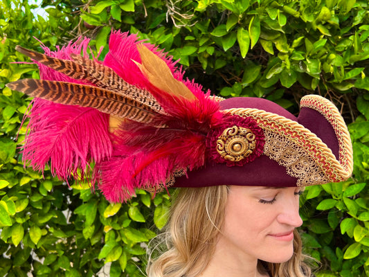 Tricorn Hat 21.75" Maroon Wool Base with Gold Trim, Feathers, and Vintage Brooch